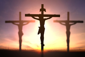 Silhouette of Jesus with Cross over rainbow sunset concept for religion, worship, Christmas, Good Friday, Easter, Jesus he is risen, Thanksgiving prayer and praise, promise