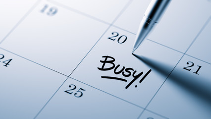 Closeup of a personal agenda setting an important date written w