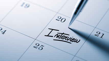 Closeup of a personal agenda setting an important date written w