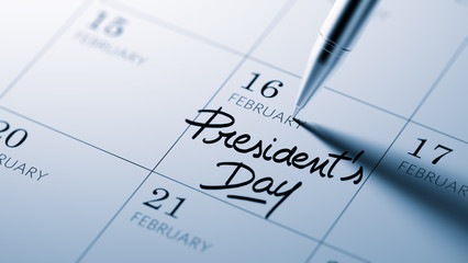 Closeup of a personal agenda setting an important date written w