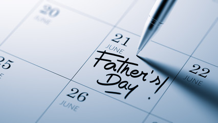 Closeup of a personal agenda setting an important date written w