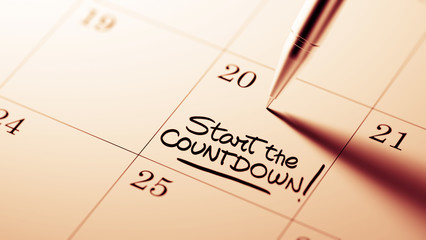 Closeup of a personal agenda setting an important date written w