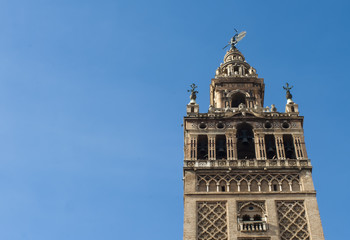 Fototapeta na wymiar Giralda in Seville, Spain, cathedral tower