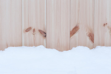snow over wooden wall background