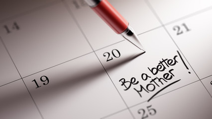 Closeup of a personal agenda setting an important date written w