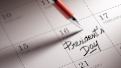 Closeup of a personal agenda setting an important date written w