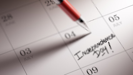 Closeup of a personal agenda setting an important date written w