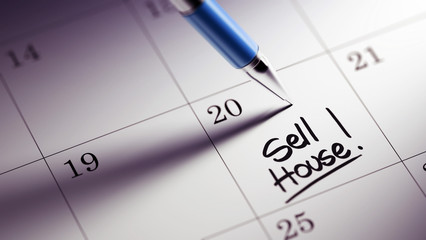 Closeup of a personal agenda setting an important date written w