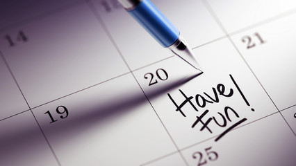 Closeup of a personal agenda setting an important date written w