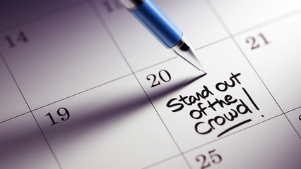 Closeup of a personal agenda setting an important date written w