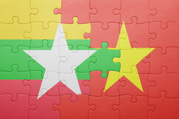 puzzle with the national flag of myanmar and vietnam