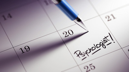 Closeup of a personal agenda setting an important date written w