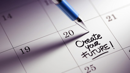 Closeup of a personal agenda setting an important date written w