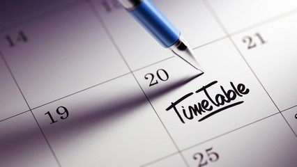 Closeup of a personal agenda setting an important date written w