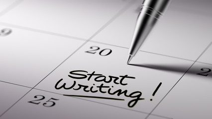 Closeup of a personal agenda setting an important date written w