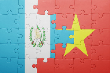 puzzle with the national flag of guatemala and vietnam
