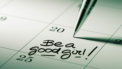 Closeup of a personal agenda setting an important date written w