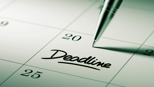 Closeup of a personal agenda setting an important date written w