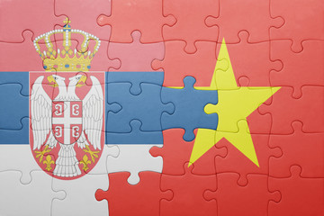 puzzle with the national flag of serbia and vietnam