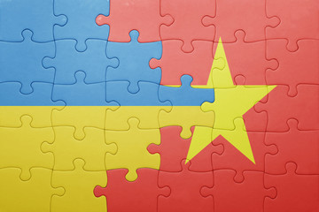 puzzle with the national flag of ukraine and vietnam