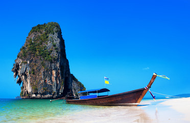 Fototapeta na wymiar Thailand beach. Beautiful tropical landscape with boat