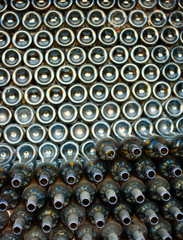 Rows of wine bottles in production factory