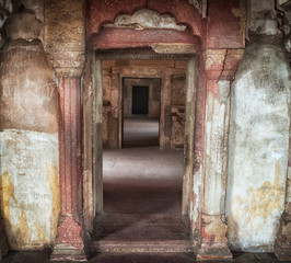 Perspective view of columns and doorways of ancient temple in India