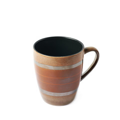Empty brown ceramic mug isolated