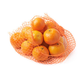 Mesh bag full of tangerines isolated