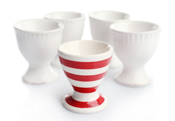 Red and White stripe egg cups, isolated on white