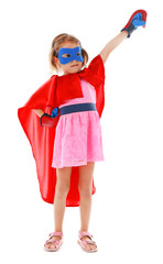 Superhero little girl poses in boxing gloves isolated on white background