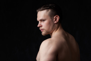 Fototapeta premium strong man with naked torso, profile