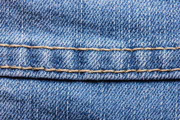 Blue jeans sew closeup texture.
