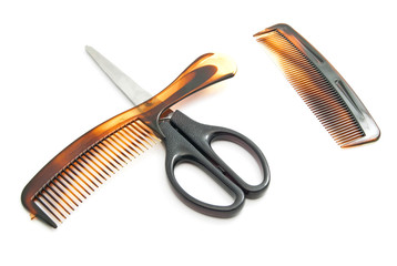 two combs and scissors