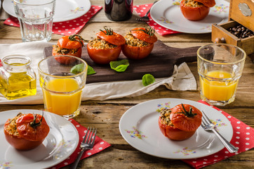 Baked tomatoes stuffed with herbs