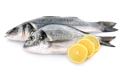Fresh fish with lemon isolated on white background