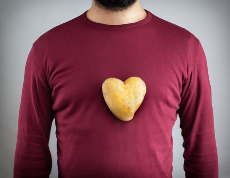 Man With A Potato Shaped Heart On His Chest.