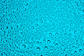 Water drops on glass surface texture.
