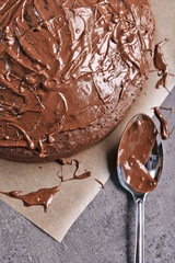 Chocolate pie with spoon, closeup