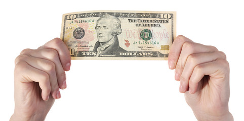Hands holding ten dollar banknote, isolated on white
