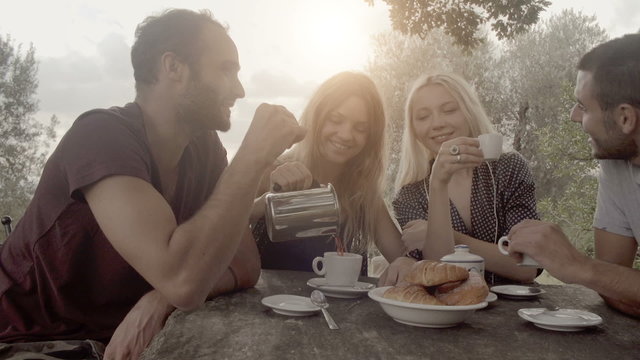Friends enjoy italian breakfast in tuscany, italy  slow motion dolly  