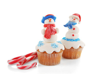 Christmas cupcakes isolated on white