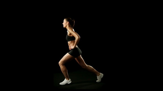Young athletic woman wearing sporstwear is exercising  slow motion  