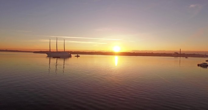 aerial view sailing yacht in the sunrise
