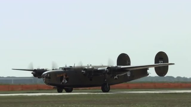 B-24 Liberator from World War II taxiing at airfield.  Recorded in 4K, ultra high definition.