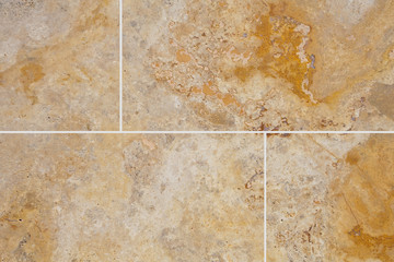 Brown stone floor tile seamless background and texture