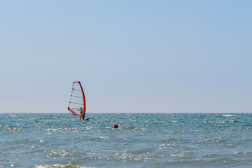 windsurfer and boat