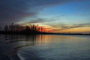 Fototapeta premium Colorful sunset from yacht, Cape Coral, Florida.