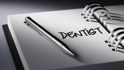 Closeup of a personal agenda setting an important date writing w