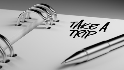 Closeup of a personal agenda setting an important date writing w